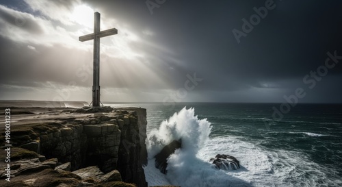 Christian cross on a cliff with ocean waves and dramatic sunlight