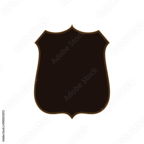 Dark brown leather shield patch with a classic scalloped edge design