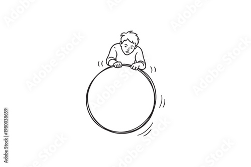 Young boy holding a large hula hoop with a thoughtful expression on his face