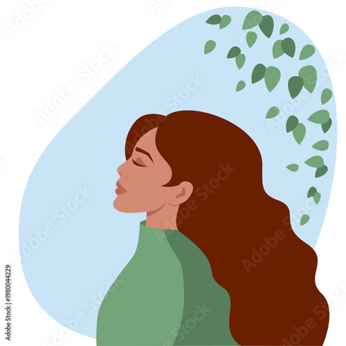 Woman with closed eyes enjoying fresh air in nature. The woman is calm and relaxed, attentive to herself.