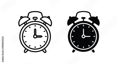 Two classic alarm clocks shown in contrasting black and white silhouette