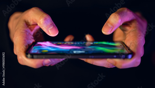 Person Using Smartphone with Abstract Colorful Game Interface