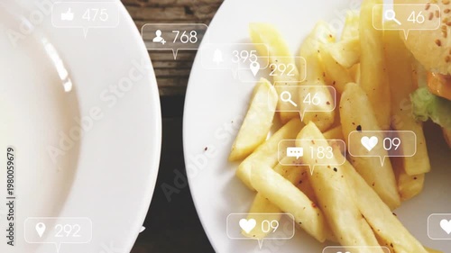 Incoming icons appearing over right plate burger fries floating shifting frame showing engagement