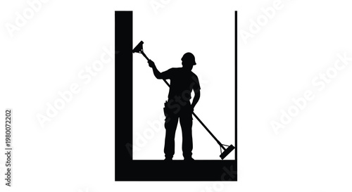 Construction worker using a tool against a wall stark silhouette