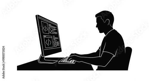 Man working at a computer focused on coding in stark silhouette