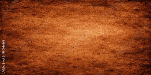 Aged vintage parchment paper texture featuring a stained brown grunge pattern on an ancient blank antique surface for a dark papyrus material backdrop