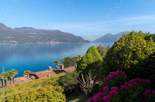 Wallpaper Mural Panoramic view of Lake Maggiore from the hills of Porto Valtravaglia, Province of Varese, Lombardy, Italy. Scenic northern Italian landscape featuring lake waters, surrounding mountains. Torontodigital.ca