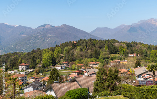 Wallpaper Mural Panoramic view of the hamlet of Poppino above Luino, Province of Varese, Lombardy, Italy. Scenic hillside village surrounded by greenery. Torontodigital.ca