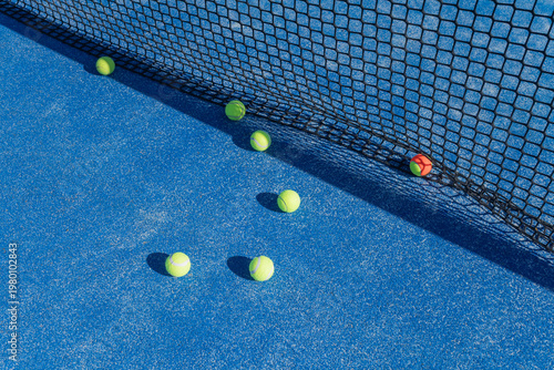 Vibrant Blue Padel Court with Yellow Balls The Concept of Healthy Lifestyle