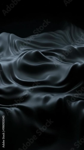 Smooth black silk fabric soft texture elegant folds luxury material abstract background gentle waves shiny surface dark color calming mood minimal modern style high contrast lighting