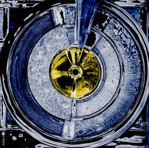 Round shape shows movement & turning, as a wheel, record, earth, world, gears. Abstract idea has a center & broad ridges of color rims that are spinning.