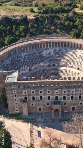 Aerial view of the ruins of the ancient amphitheater of Aspendos, Antalya region, Türkiye.