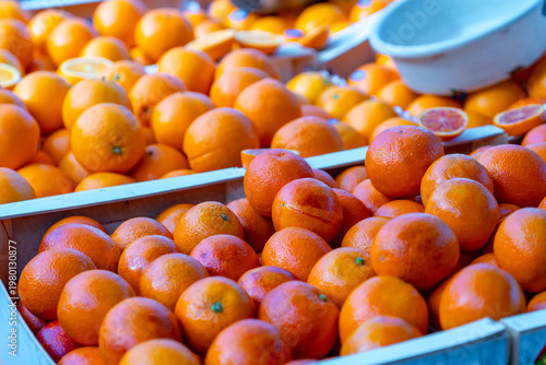 Citrus fruits displayed at the market, tangerines and other fruits