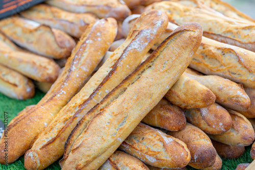 Different types of bread displayed at a street market. Food