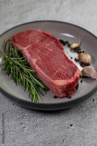 Beef steak with rosemary , salt and pepper