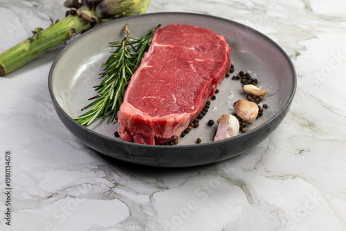 Beef steak with rosemary , salt and pepper