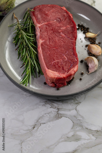 Beef steak with rosemary , salt and pepper