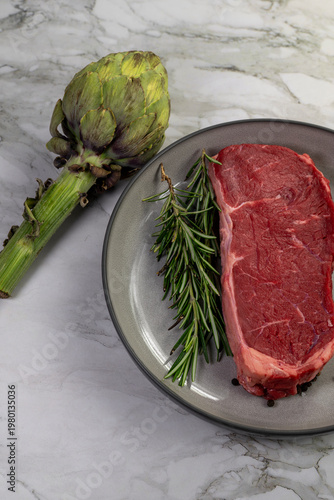 Beef steak with rosemary , salt and pepper