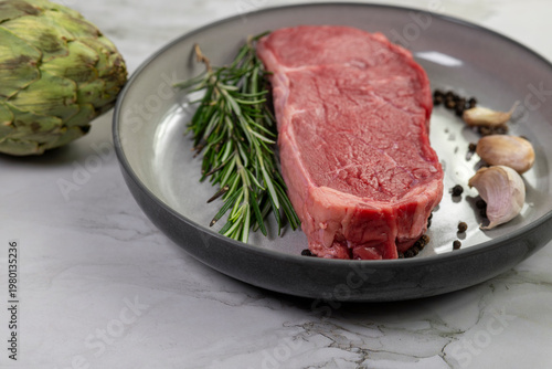 Beef steak with rosemary , salt and pepper