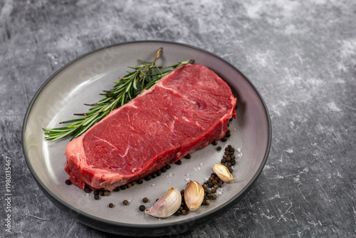Beef steak with rosemary , salt and pepper