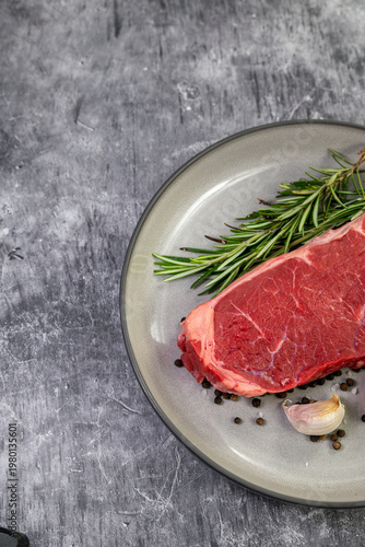 Beef steak with rosemary , salt and pepper