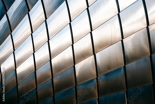 Fotografi Natural silver stainless steel texture seamless background with curved diagonal