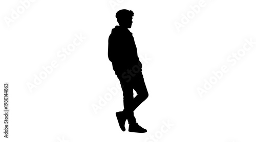 Foto Silhouette of a young man in casual clothes leaning against an invisible surface