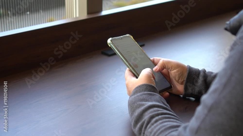 Using Mobile phones in hands looking posts social media chatting call