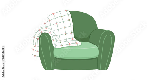 A cozy green armchair with a patterned blanket draped over its back and armrest