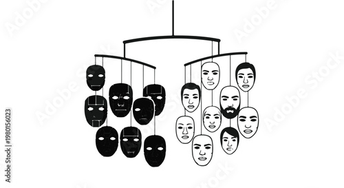 black and white faces hanging from mobile