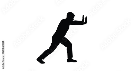 Black silhouette of a man pushing something with both hands in a defensive stance strongly