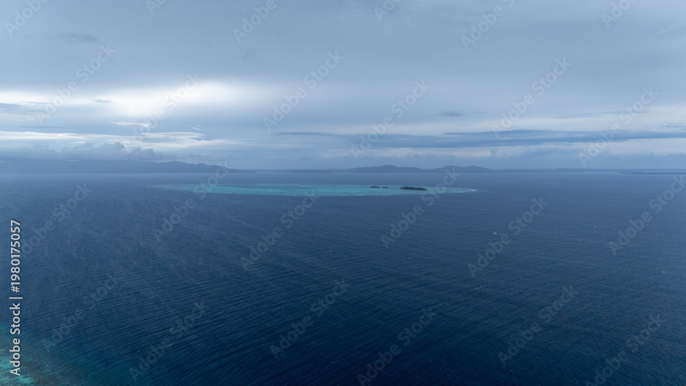 Fototapeta premium Drone Aerial View of Onok Island, Balabac, Philippines. Tropical Beach, Clear Water, Coral Reefs and Turtles.