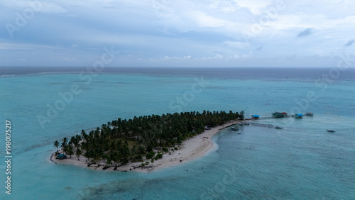 Drone Aerial View of Onok Island, Balabac, Philippines. Tropical Beach, Clear Water, Coral Reefs and Turtles.
