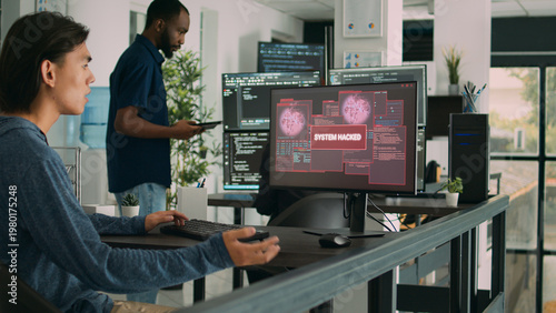 Photos Asian programer focused on writing code encounters unexpected compiling error, being hacked in software development office