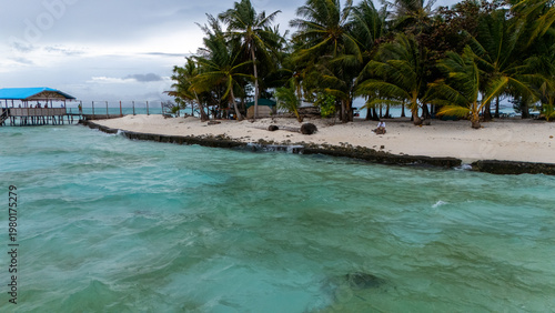 Drone Aerial View of Onok Island, Balabac, Philippines. Tropical Beach, Clear Water, Coral Reefs and Turtles.