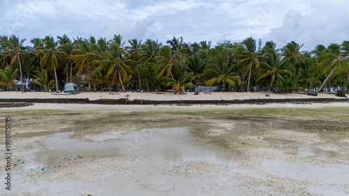 Drone Aerial View of Onok Island, Balabac, Philippines. Tropical Beach, Clear Water, Coral Reefs and Turtles.