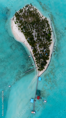 Drone Aerial View of Onok Island, Balabac, Philippines. Tropical Beach, Clear Water, Coral Reefs and Turtles.