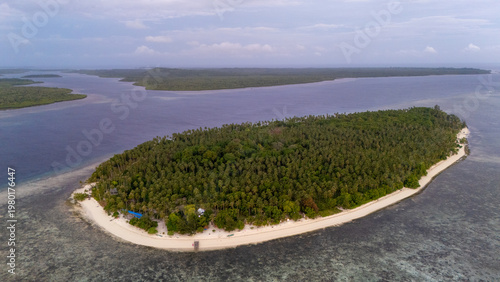 Drone aerial view of the beautiful raw Sicsican Island or also called Caxisigan Island in Balabac. Part of the Kamp Malaya expedition.