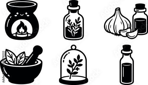 Aromatherapy bottles garlic and mortar with leaves