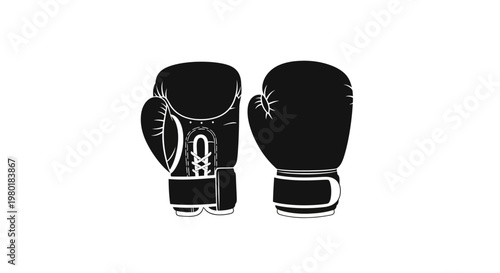 A pair of black boxing gloves presented in stark contrast silhouette