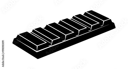 Black chocolate bar divided into rectangular segments a dark silhouette