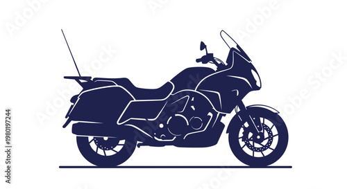 A dark blue motorcycle with a windshield and saddlebags.