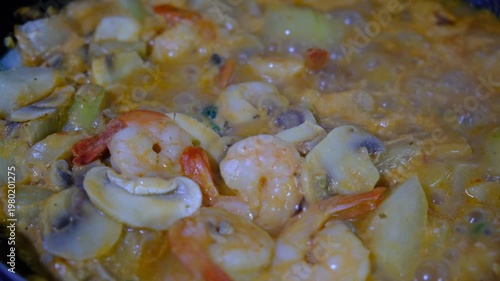 Plump shrimp and mushrooms simmer in a wine sauce, enriched with aromatic broth. The kitchen fills with warm, inviting scents, hints of herbs, the gentle tang of wine. Simplicity, aromatic, healthy