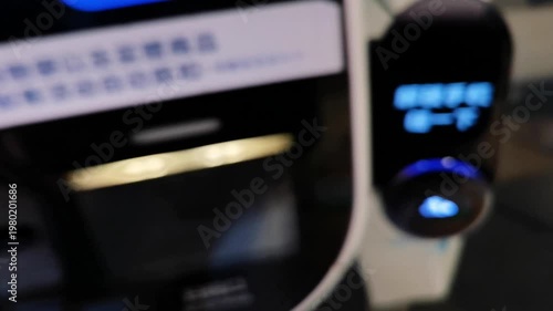 Blurred mall self-checkout payment footage with ambient sound, customers scan QR code, privacy-safe commercial B-roll