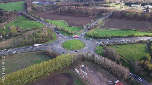 The pulse of Scottish road transport at the Sheriffhall interchange. High-resolution footage of traffic flow on the A720 Edinburgh City Bypass during a bright day.