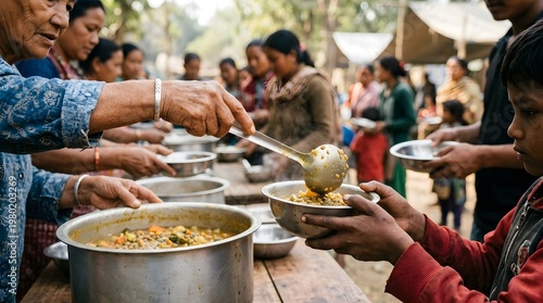 Volunteers serving food to people in need during crisis.