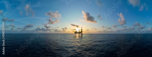 Obraz na płótnie Aerial panoramic view of offshore jack up rig and offshore platform for oil and gas exploration and production