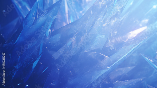 Close-up of sharp, translucent blue crystals with intricate facets reflecting light in an abstract, icy formation.