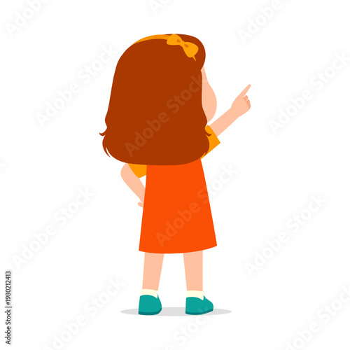 Little girl with brown hair and yellow bow wearing orange dress pointing finger away from camera in a curious pose