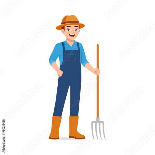 Happy young man farmer standing with a rake wearing a straw hat and overalls smiling cheerfully